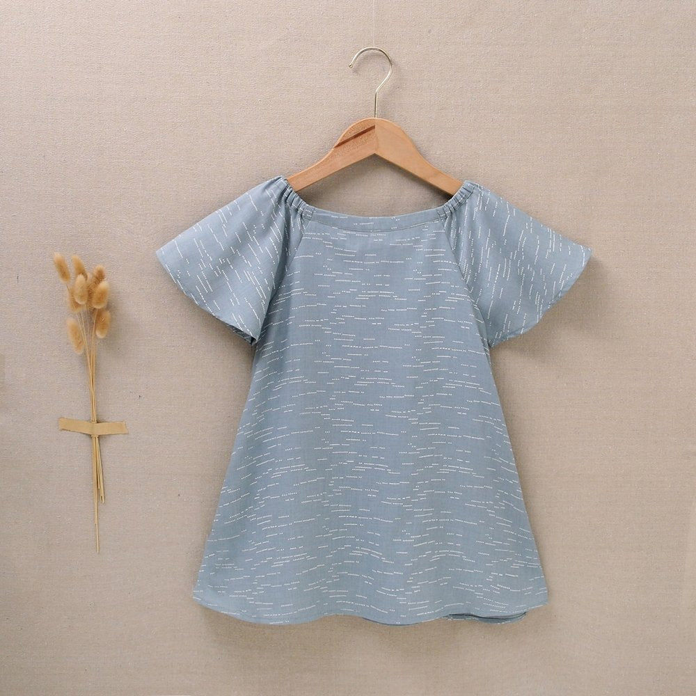 Vestido de niña estampado en color azul petróleo