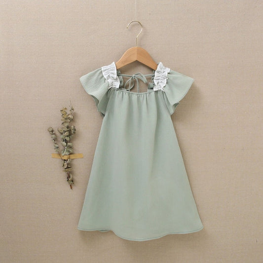vestido de niña  verde olivo con volantes en contraste