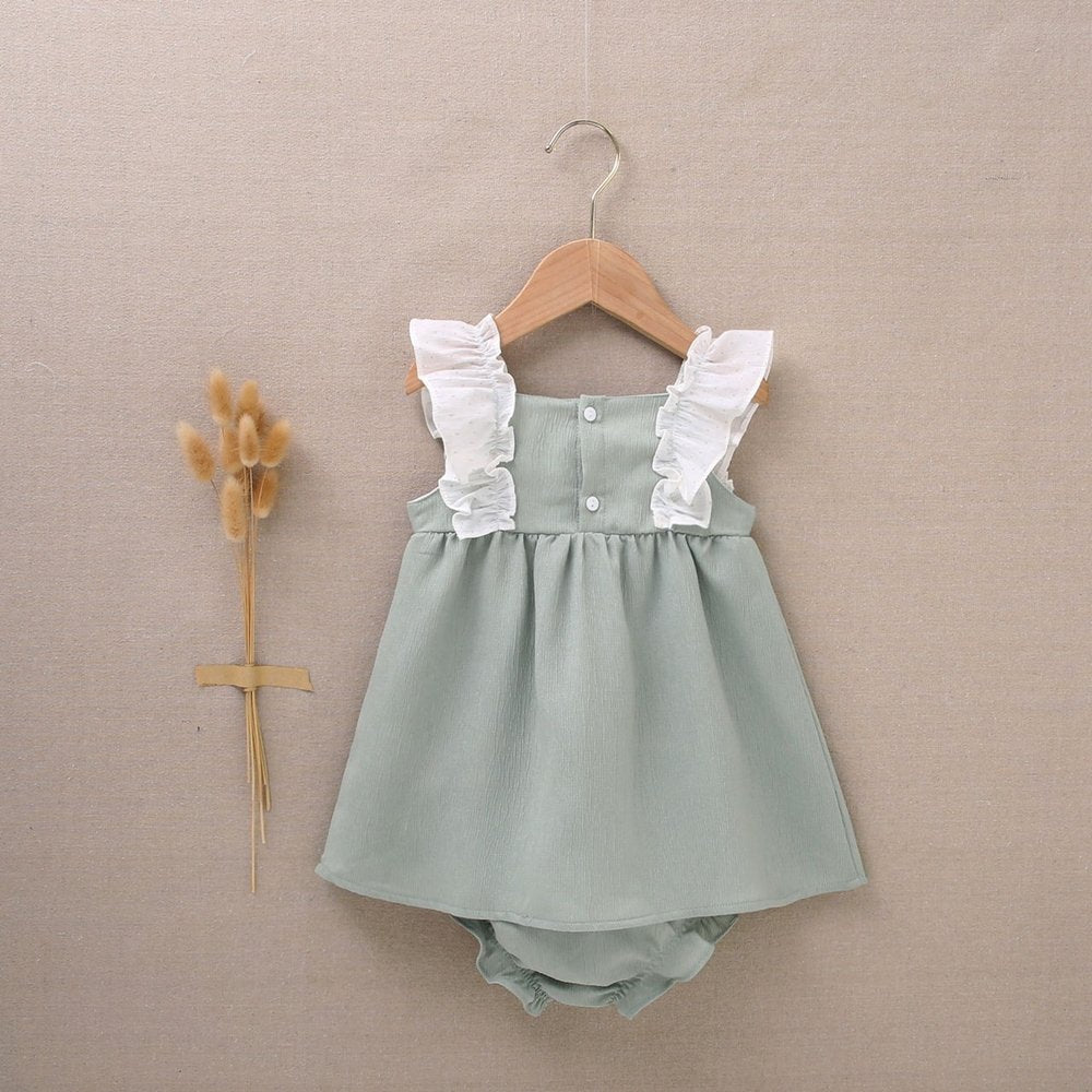 vestido de bebé niña con cubrepañal en bambula verde olivo con volantes en contraste