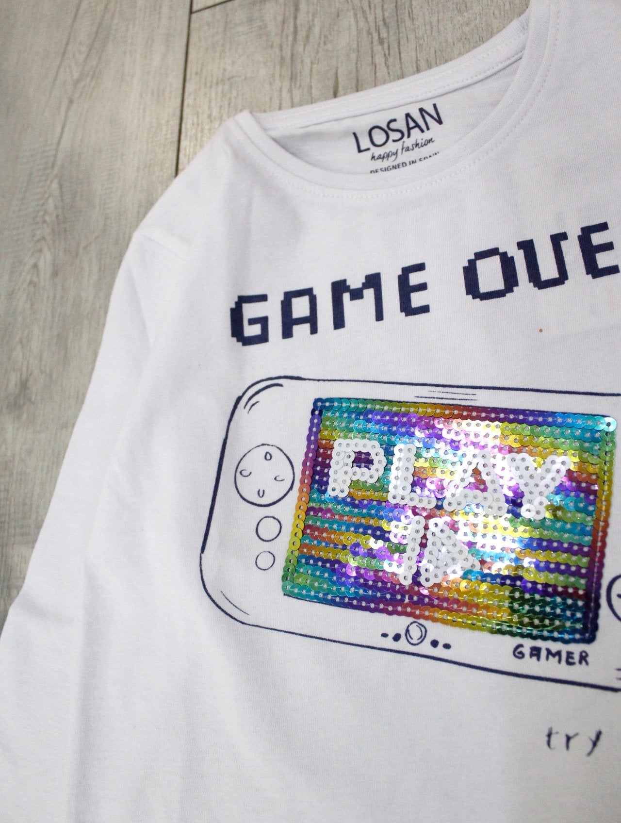 camiseta manga larga color blanco "game over"