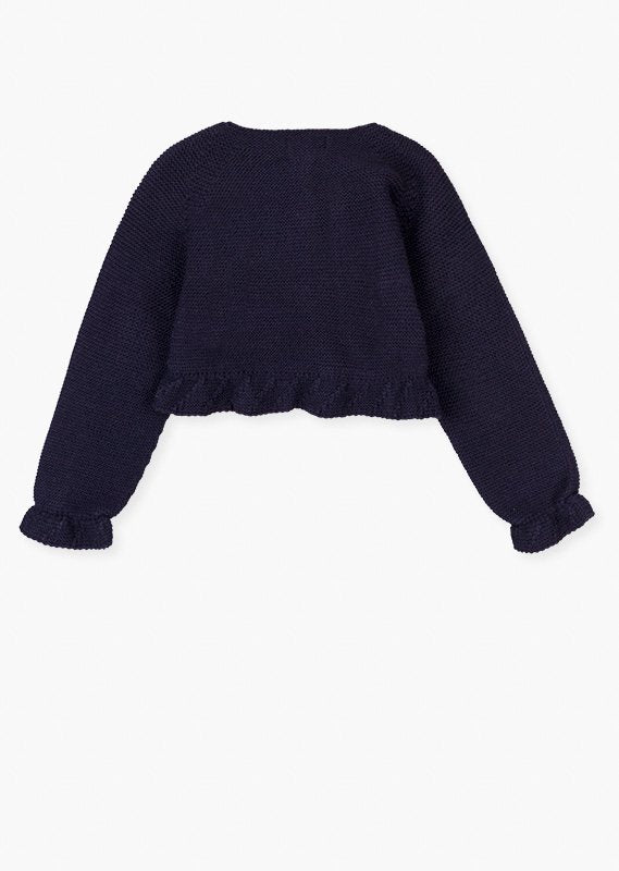 chaqueta con volantes en los puños