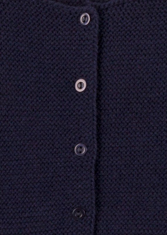 chaqueta con volantes en los puños