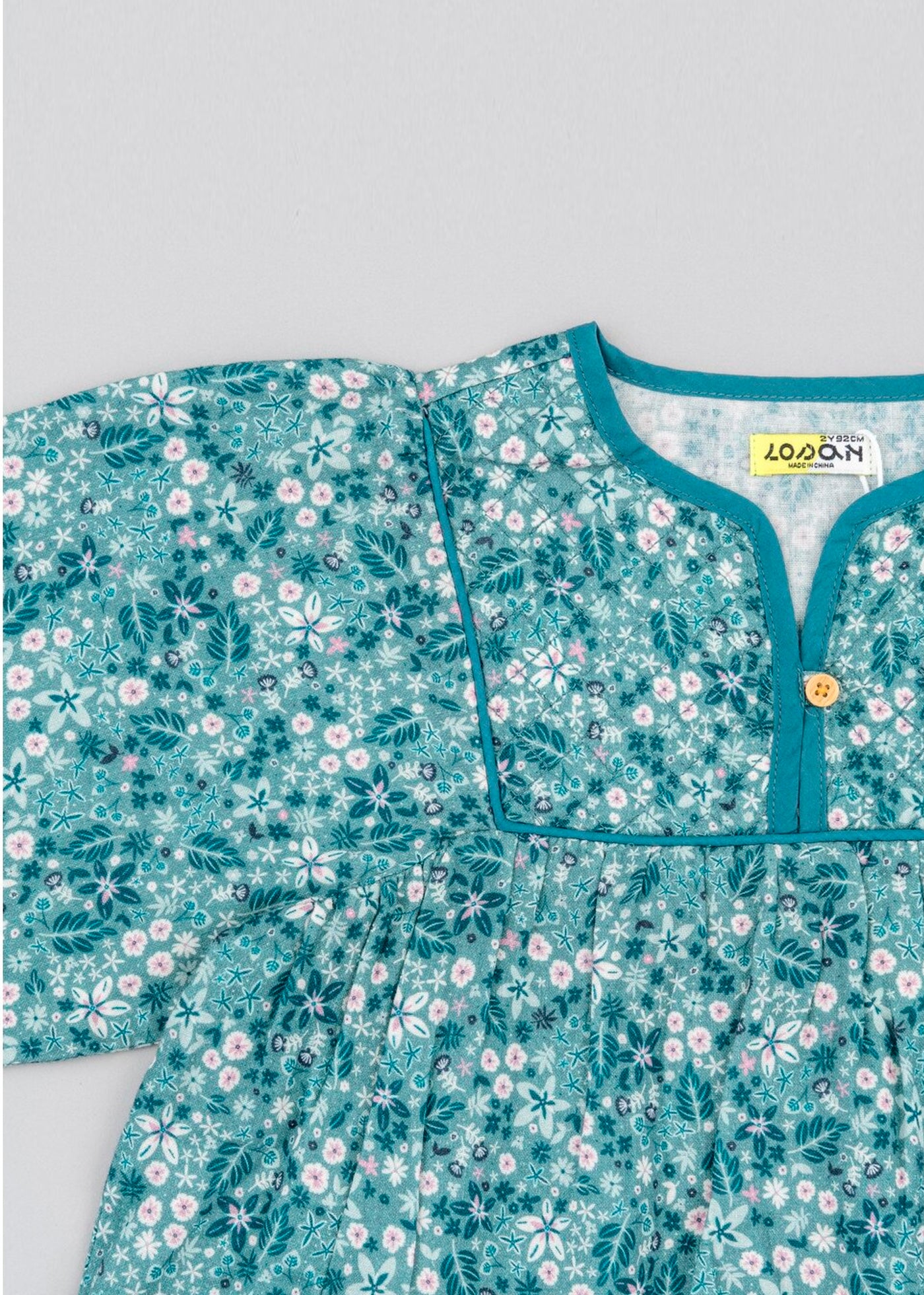 Vestido manga larga color verde turquesa flores