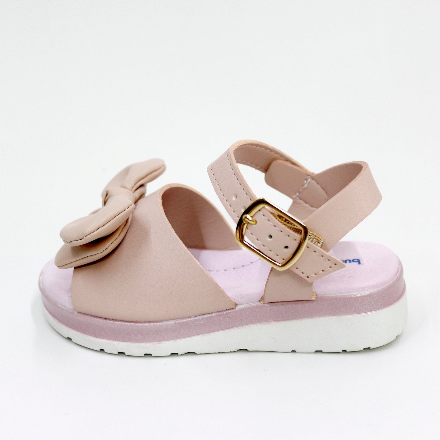 huarachito con moño color nude, hebilla dorada