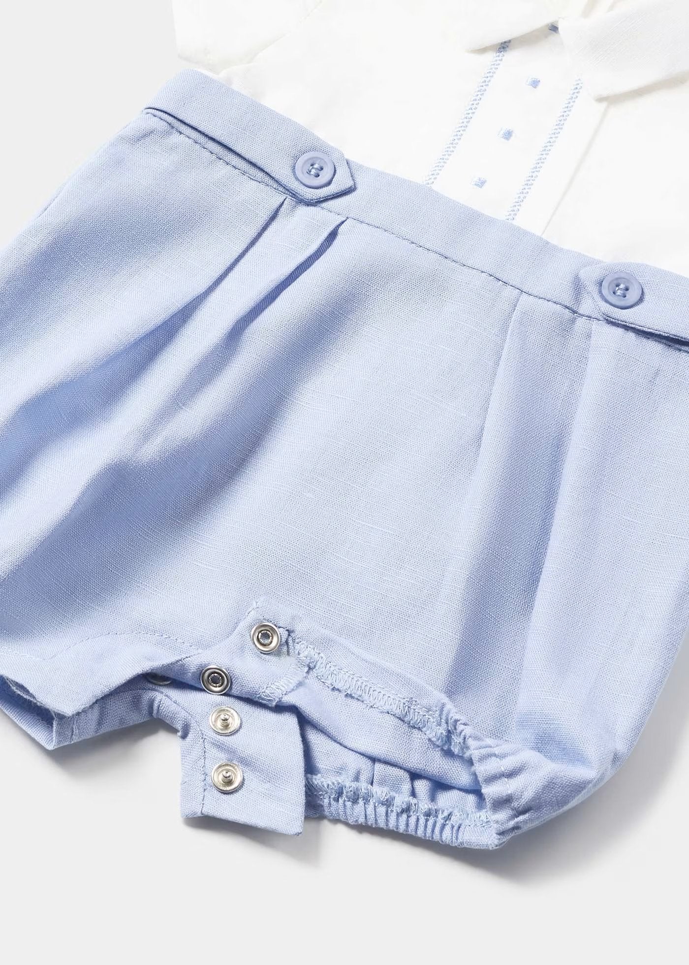 pelele corto de lino color azul niagara