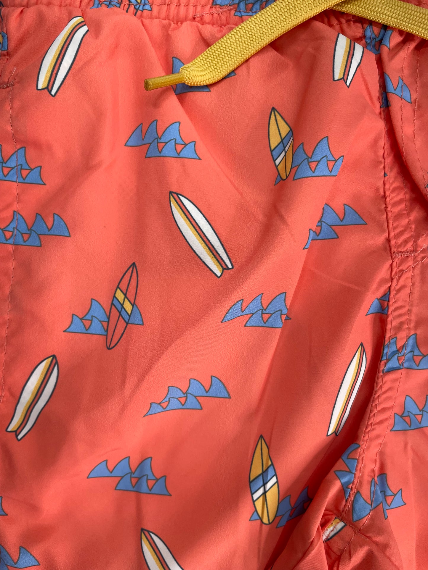 Traje de baño azul y naranja