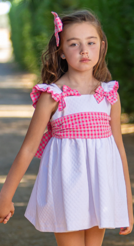 Vestido color blanco con moños rosas en hombros