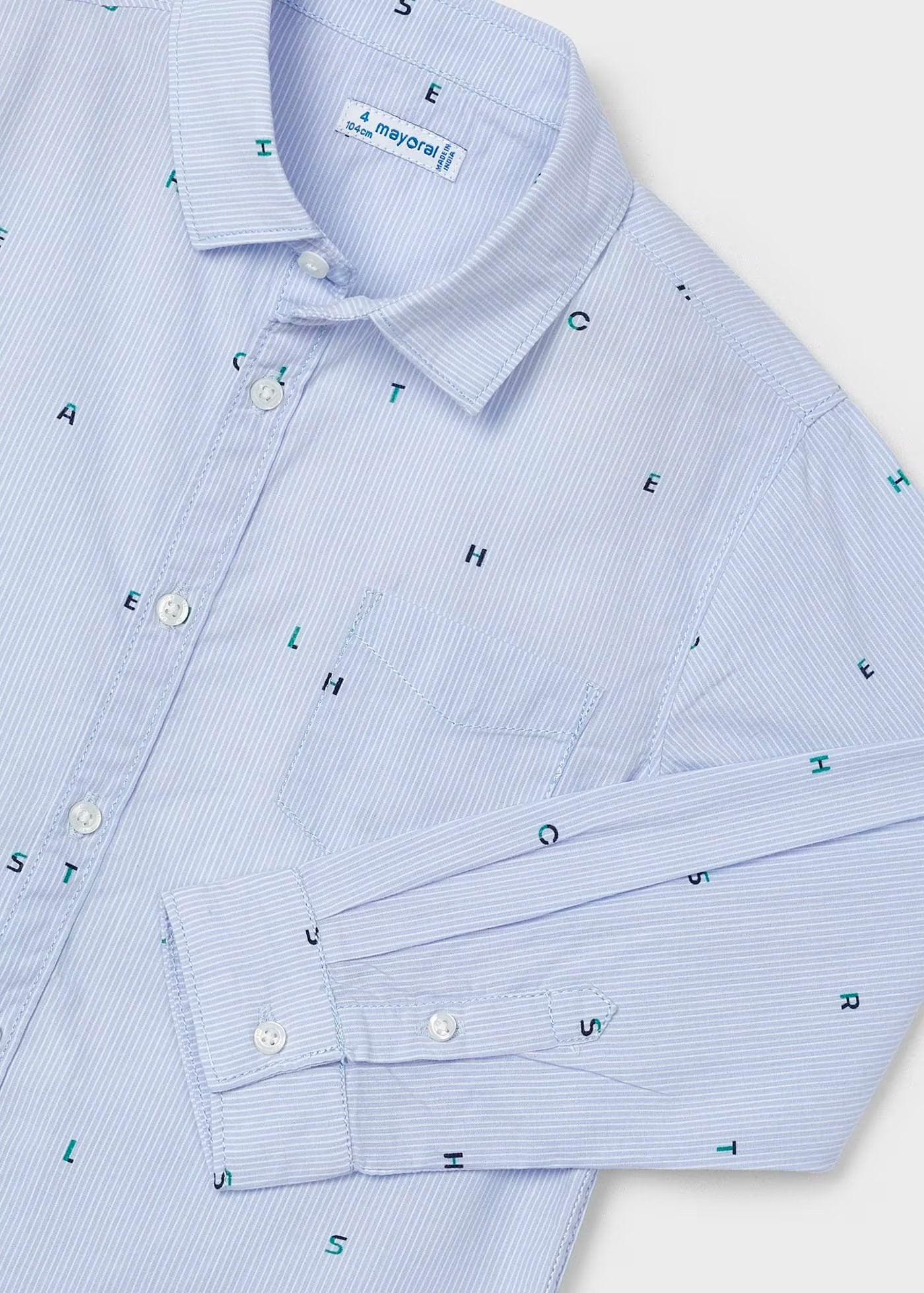 camisa manga larga, color azul celeste con prints