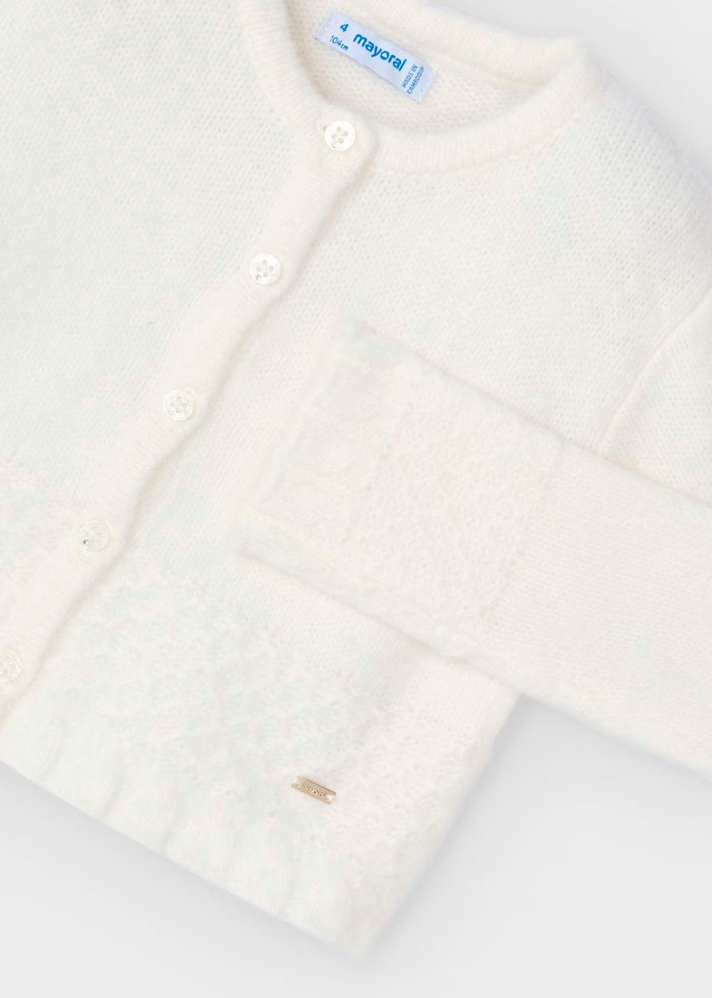 rebeca color crudo, detalle en mangas