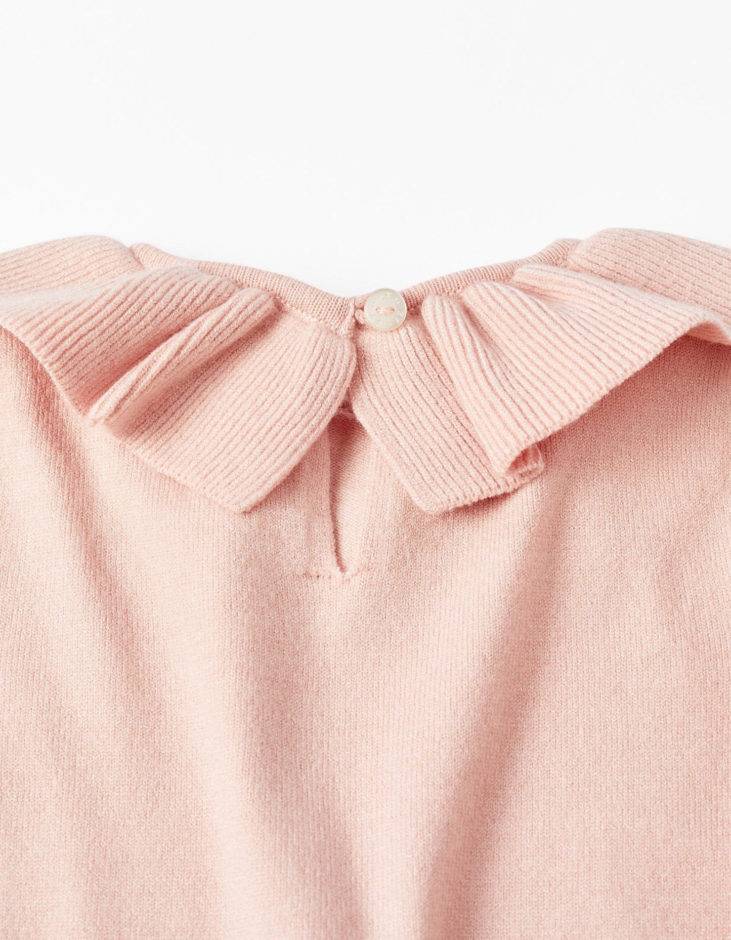 sudadera de punto con volantes en cuello y brazos