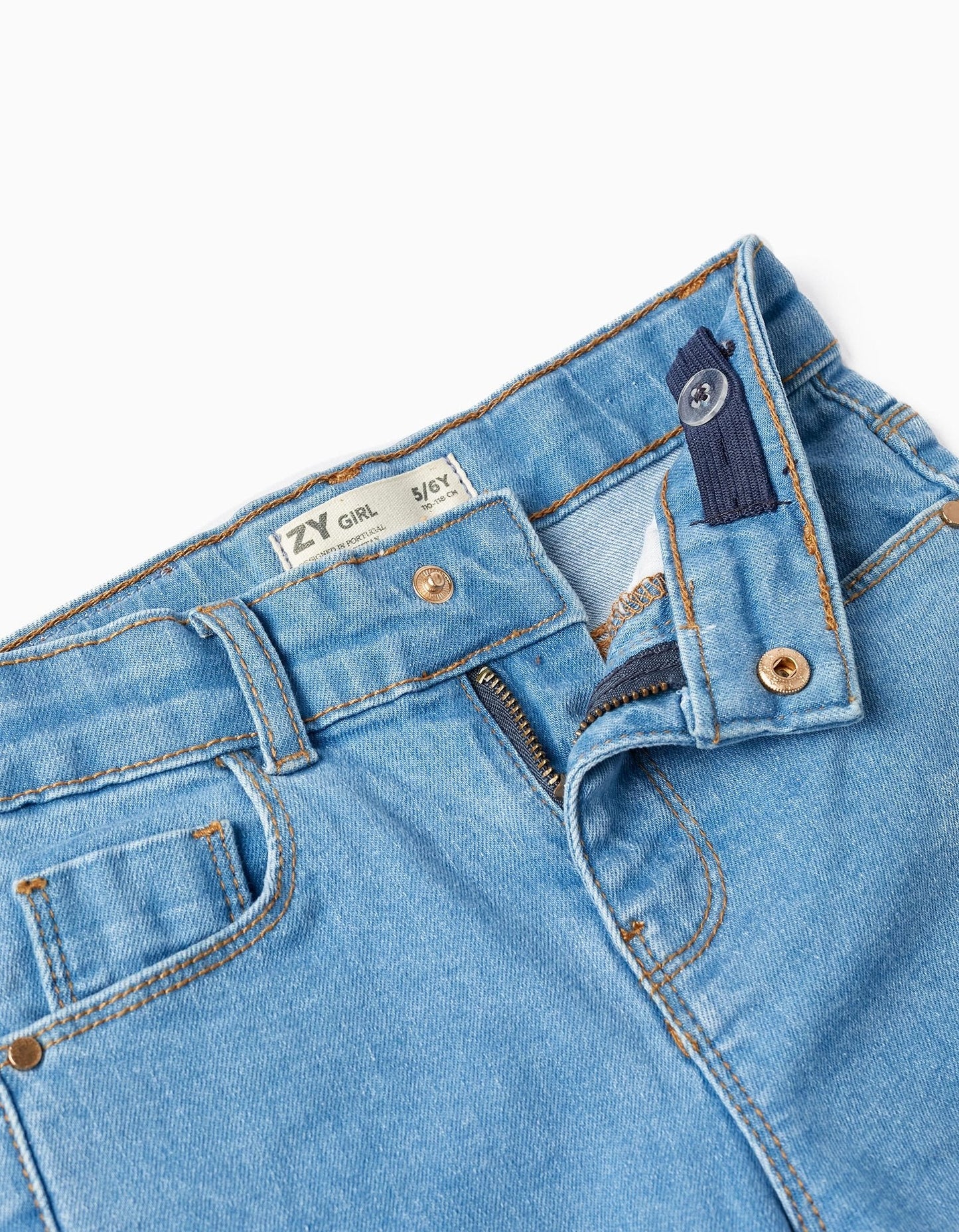 pantalón vaquero skinny azul claro. denim de algodón, zippy