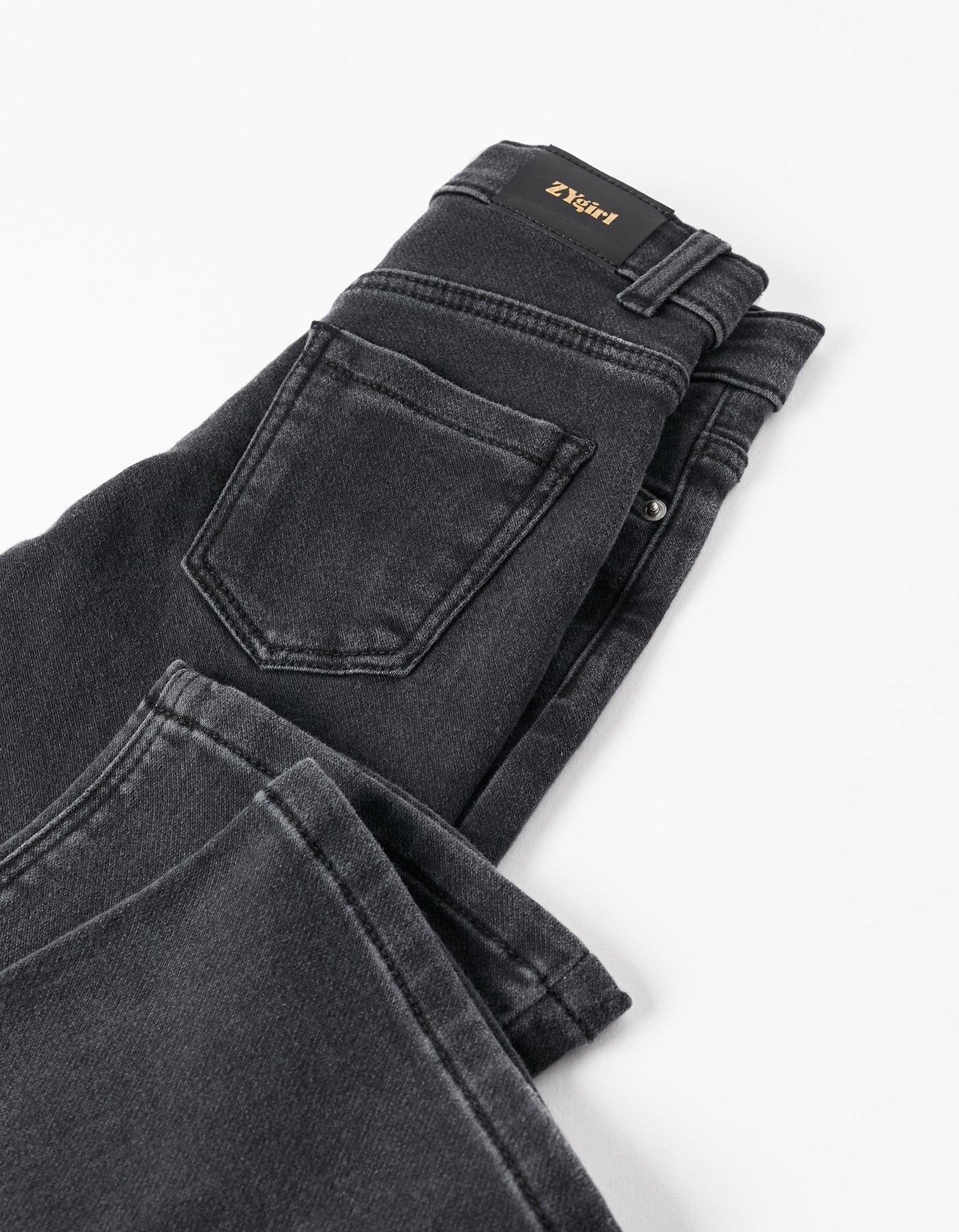 pantalón vaquero, denim negro, flare fit para niña. zippy.