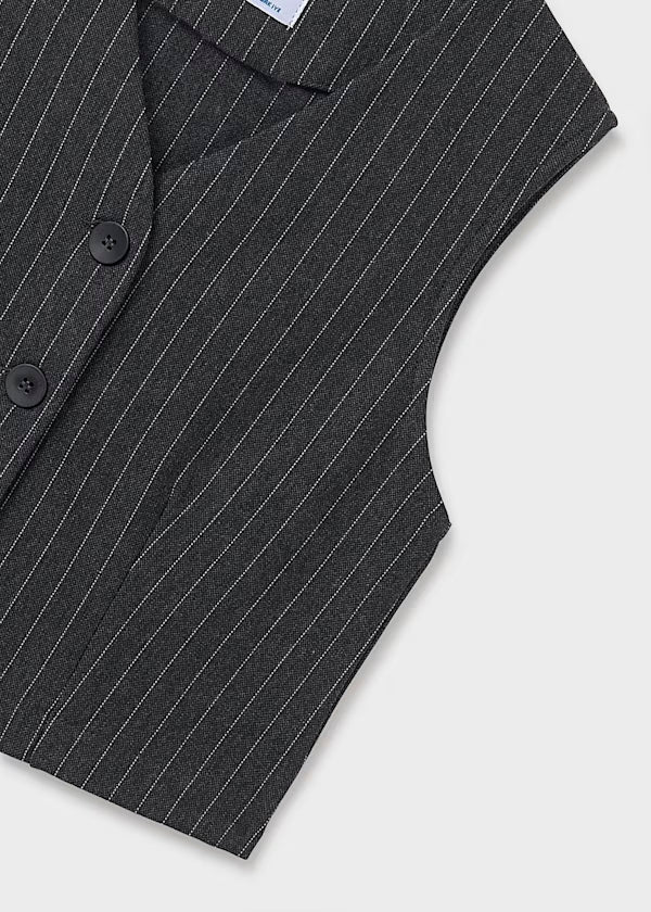 conjunto chaleco y falda a rallas remaches lateral