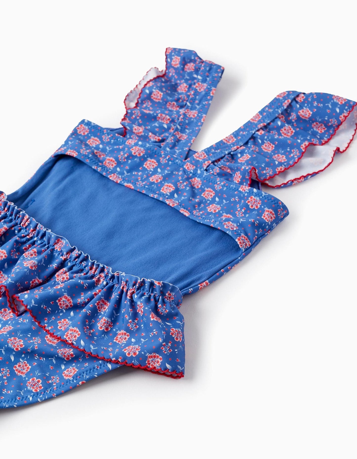 traje de baño una pieza color azul, espalda descubierta