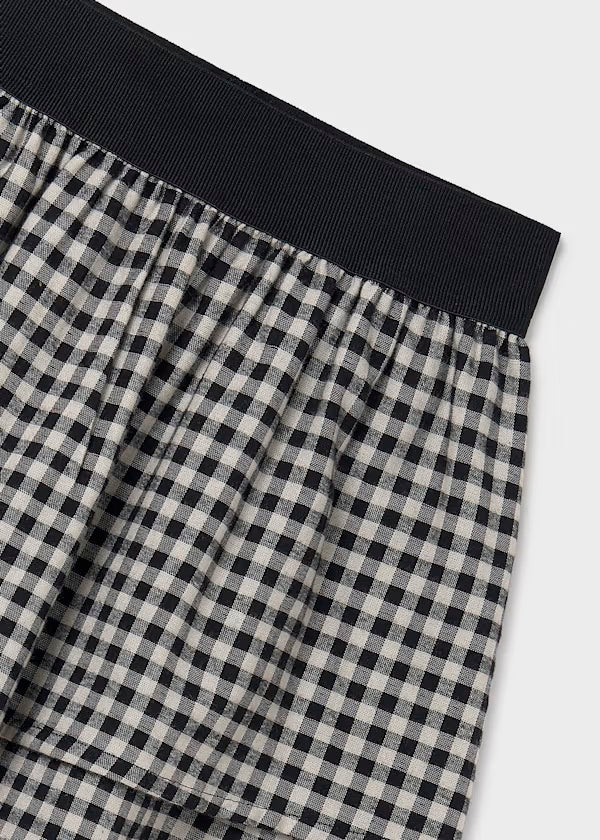 conjunto camiseta manga larga y falda a cuadros