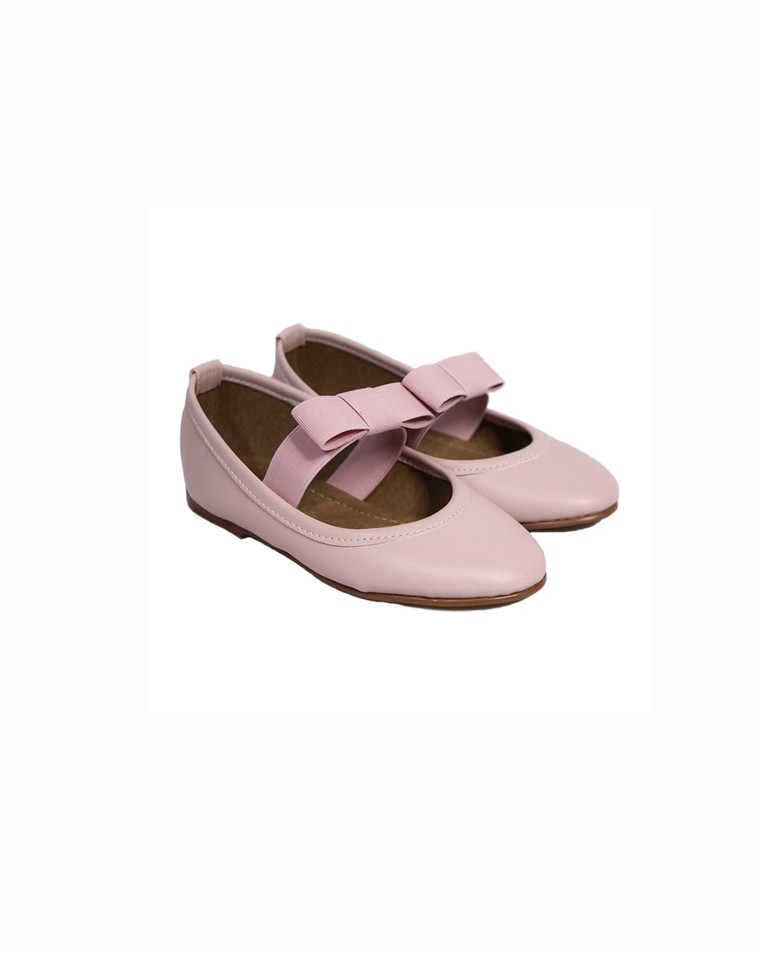 zapato color rosa con moño listón