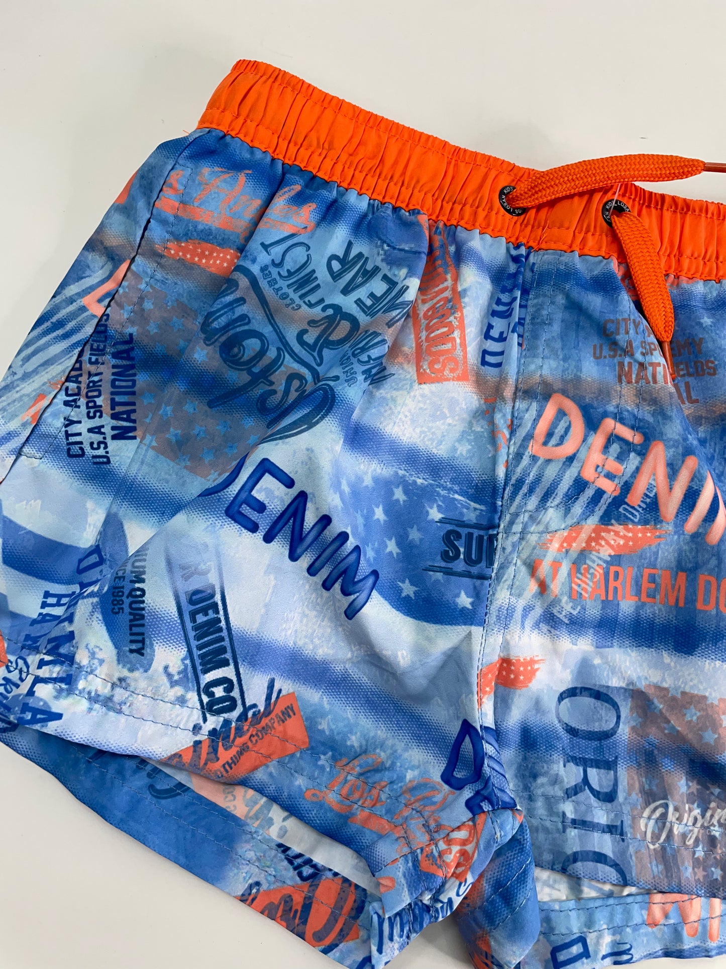 Bañador azul con elastico naranja
