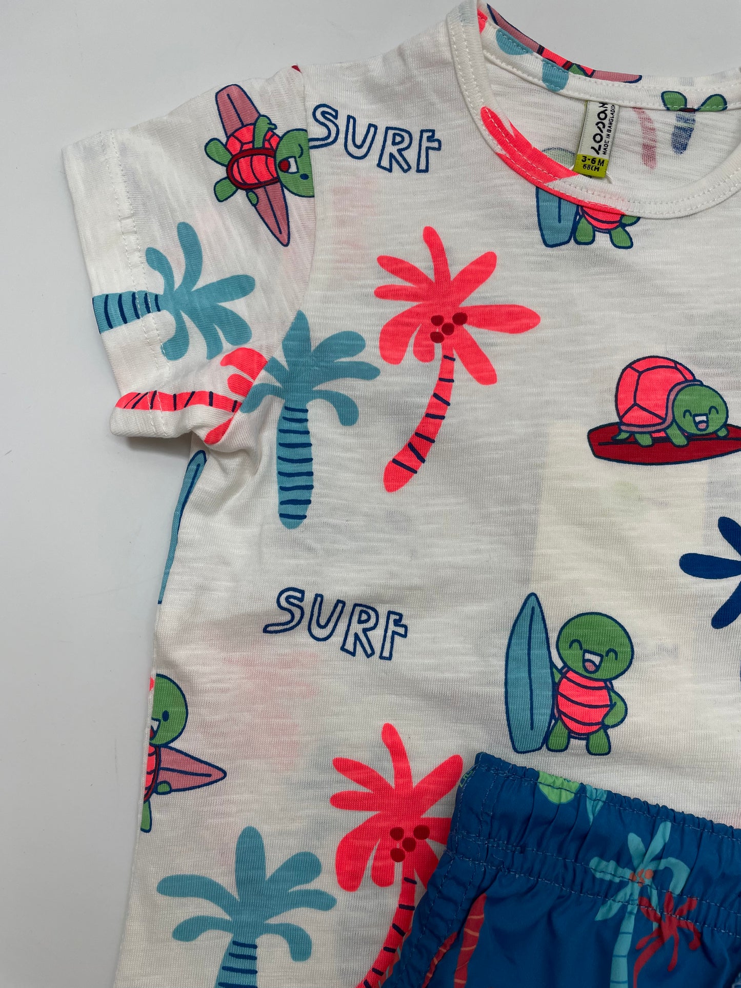Traje de baño azul y blanco, bebe niño