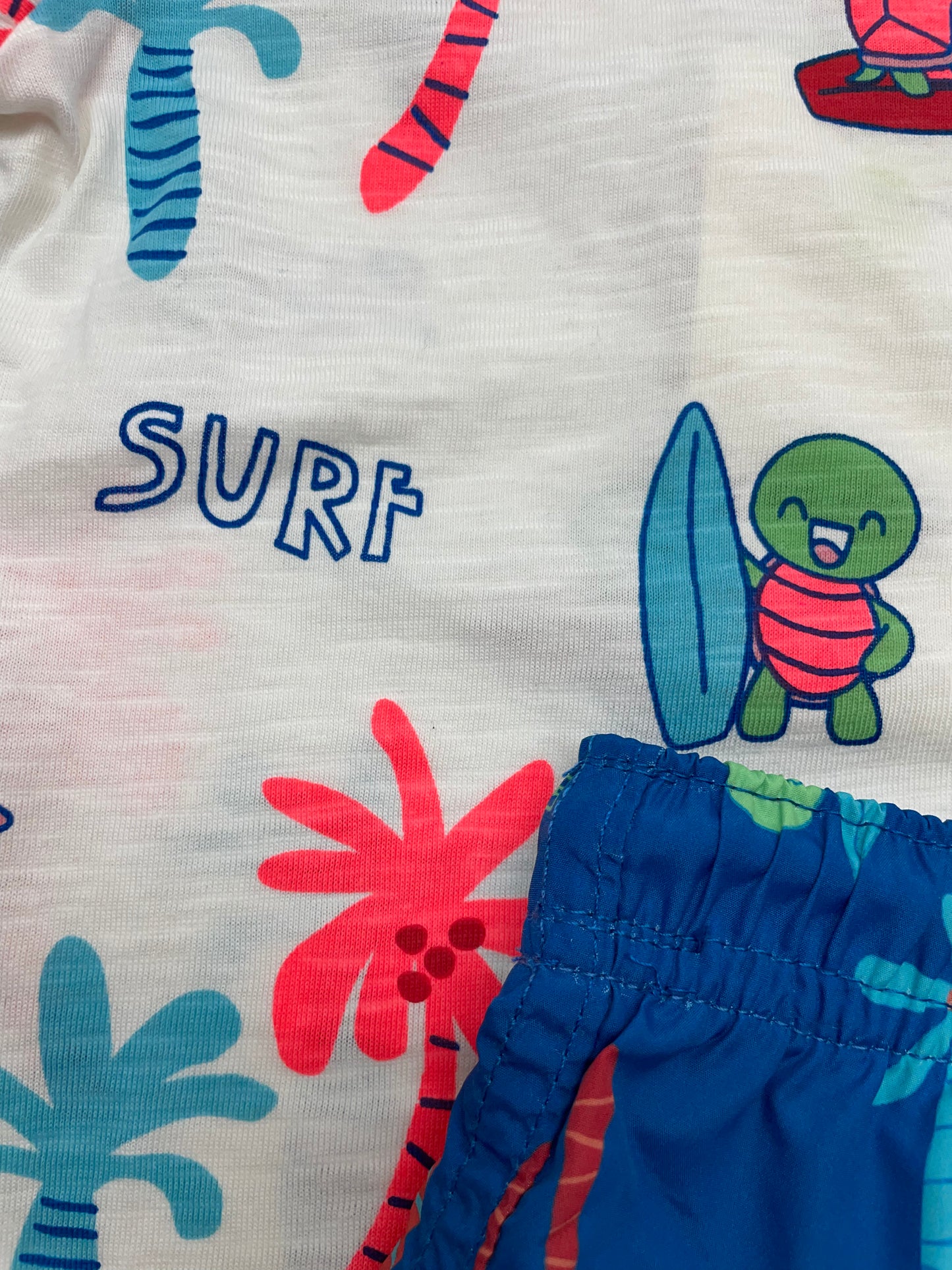 Traje de baño azul y blanco, bebe niño