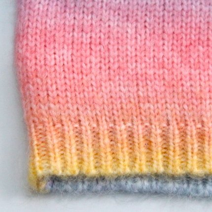 suéter de colores arcoiris para bebe
