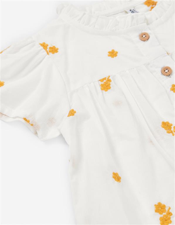 Conjunto pantalon y blusa blanca con flores