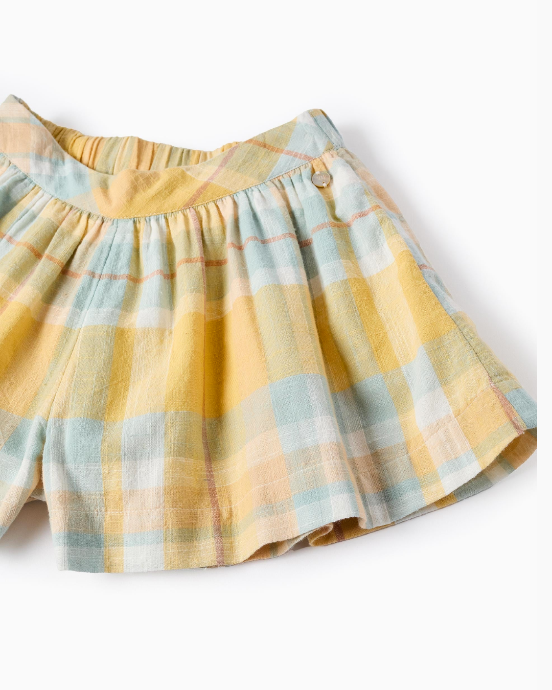 Conjunto blusa amarilla y short a cuadros