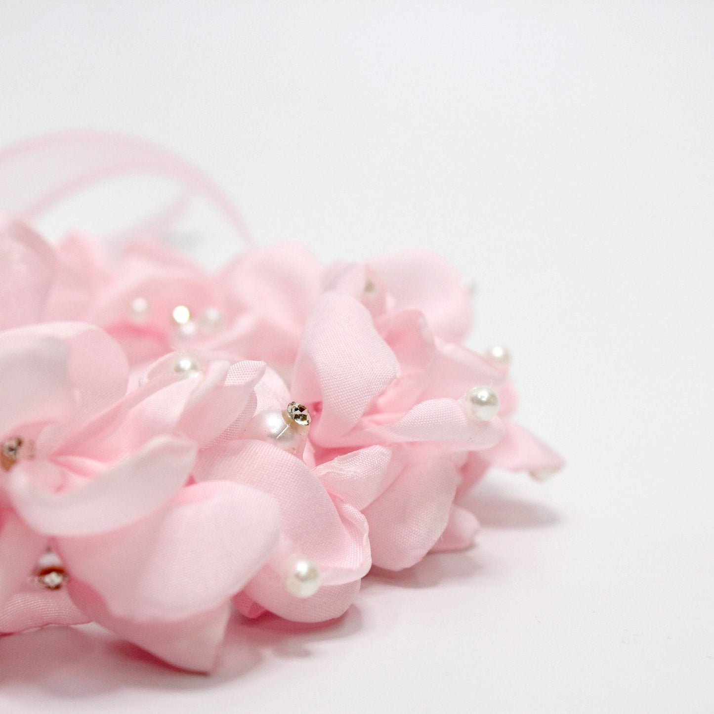 corona de flores rosa