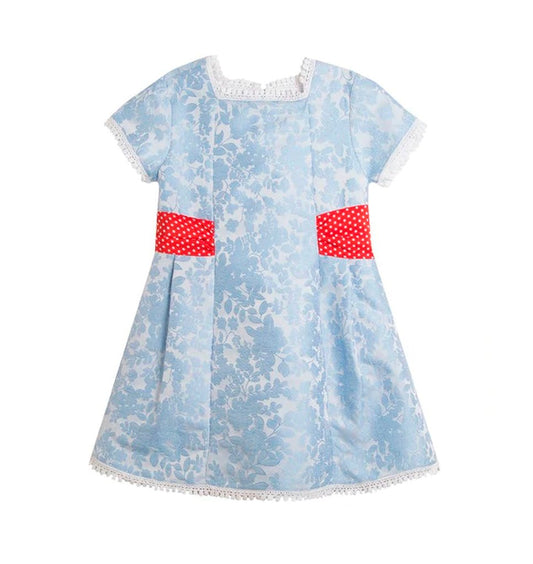 vestido azul con moño rojo en la parte de atrás