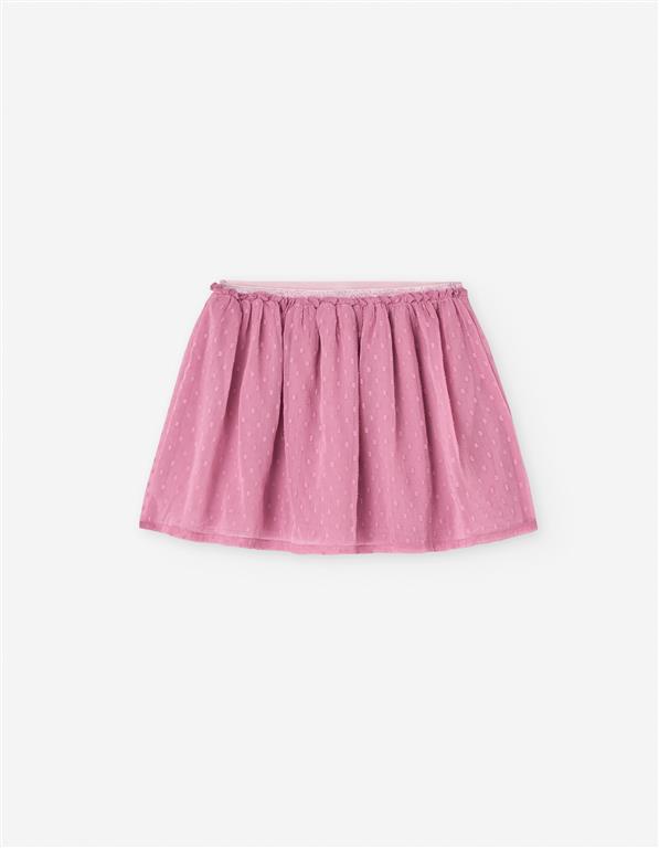 Conjunto falda plumeti rosa con jersey color crudo