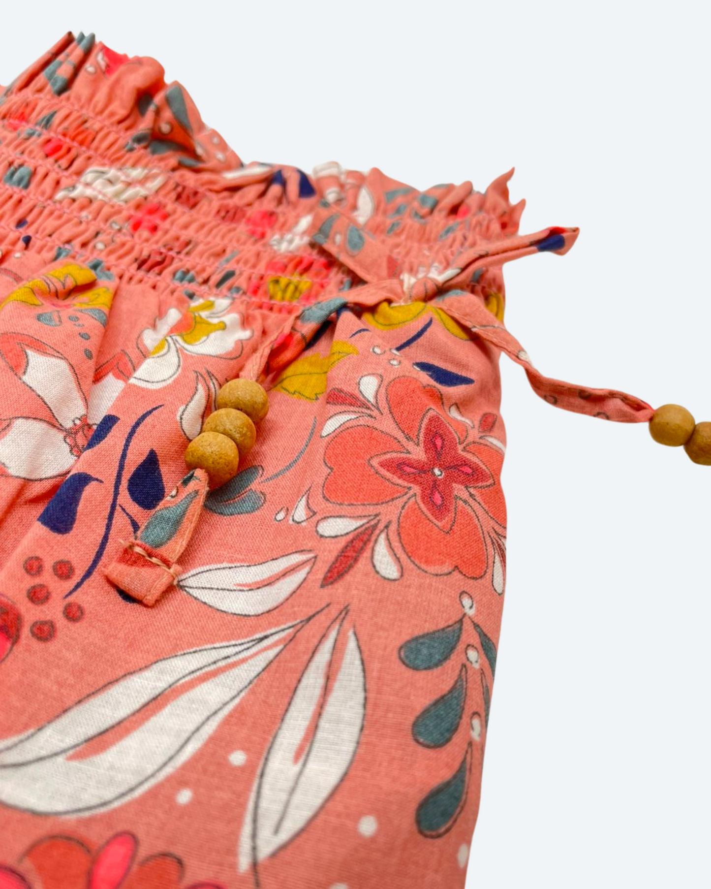conjunto coral floreado y pantalon bombacho