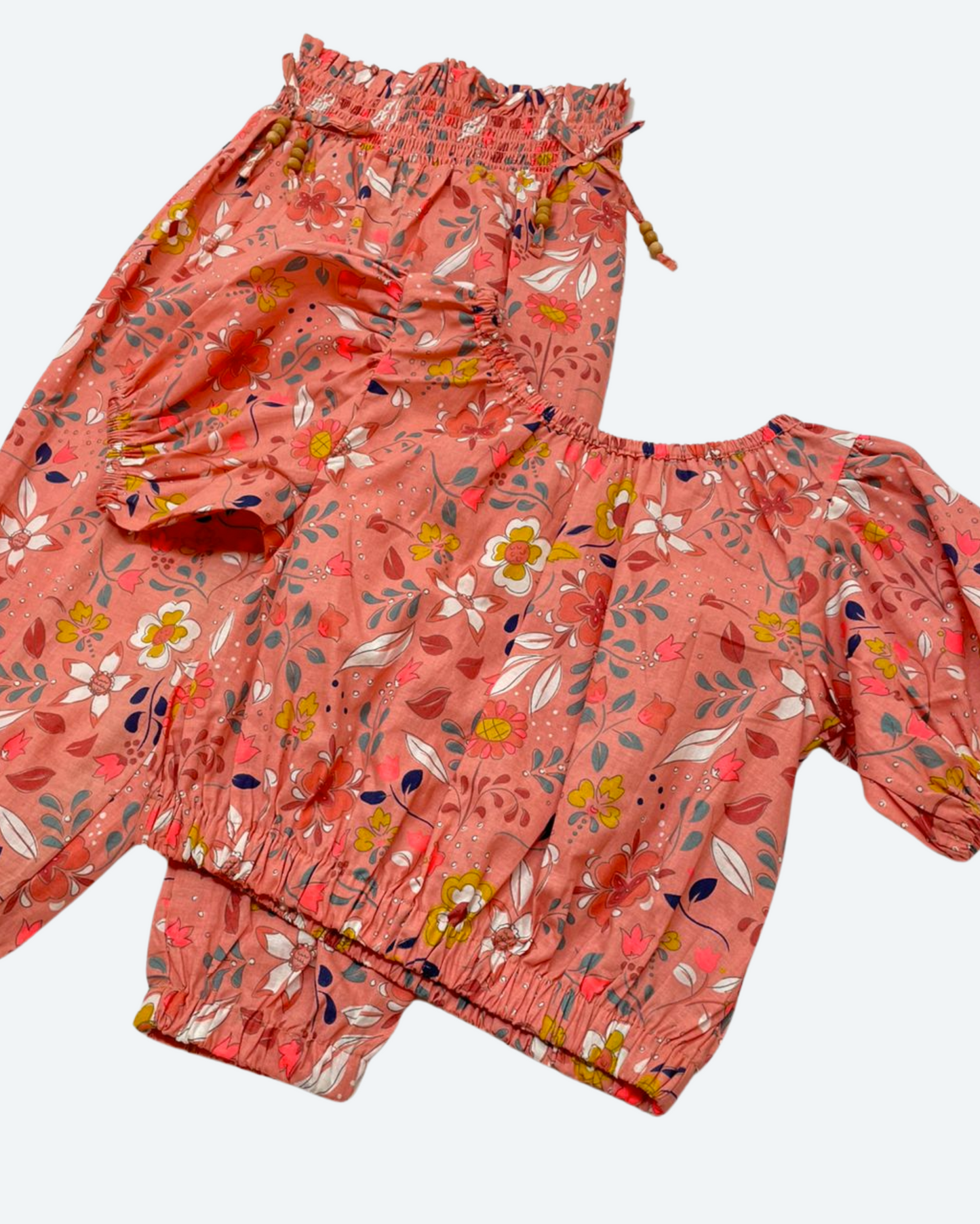conjunto coral floreado y pantalon bombacho