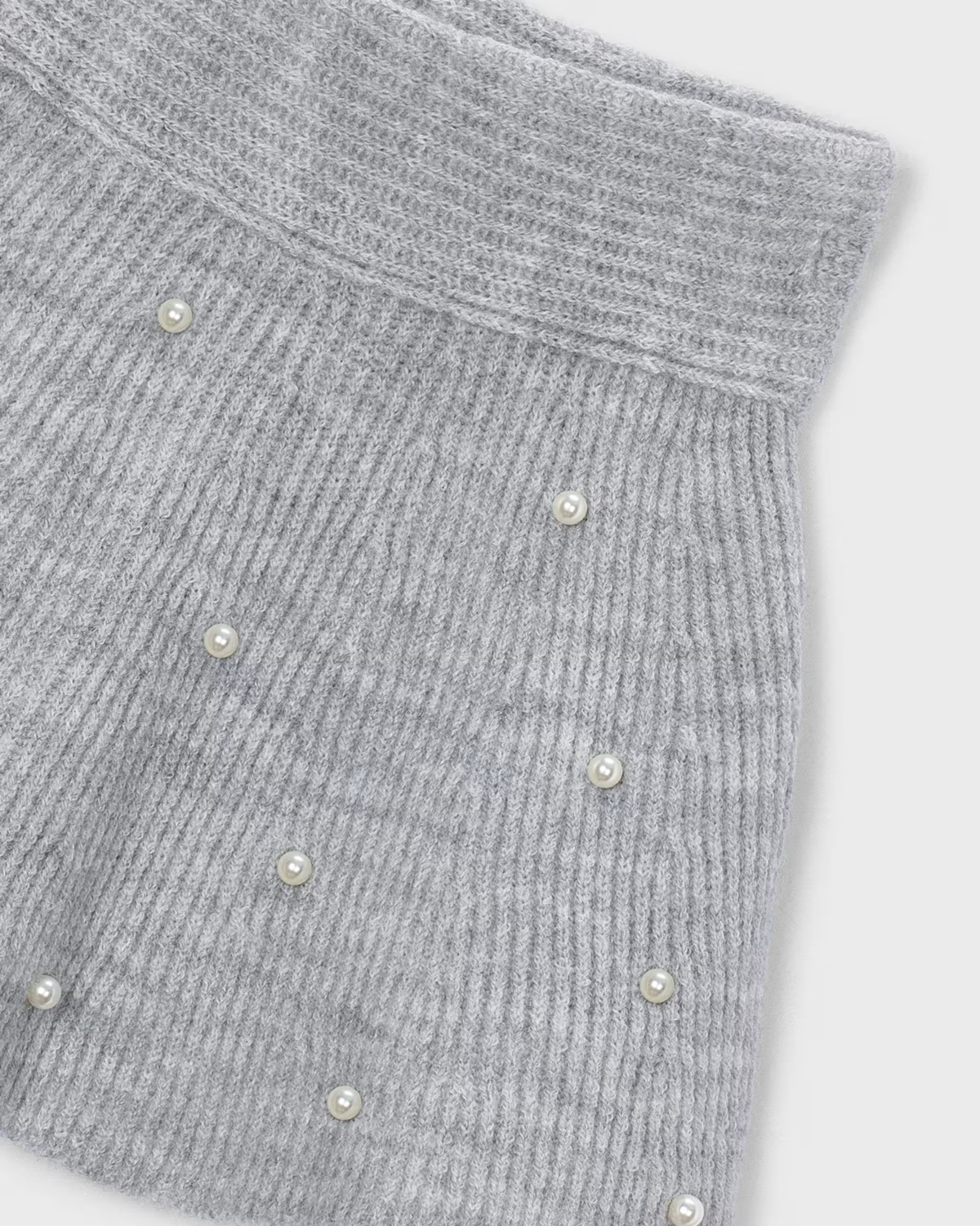 Set 2 piezas + falda tricot + jersey tricot gris con perlas