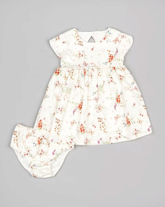 vestido color crema con flores naranjas, para bebé