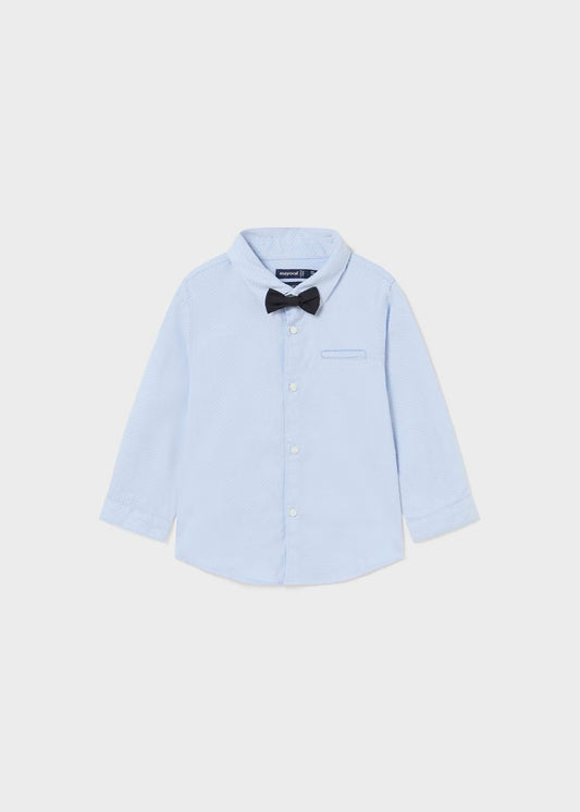 camisa azul celeste con moñito
