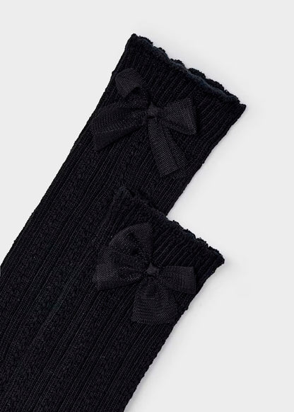 Calcetín alto color negro para niña