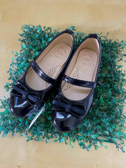 zapato de charol con moño