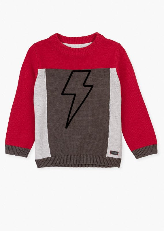 jersey con mangas rojas y parche de rayo en el pecho