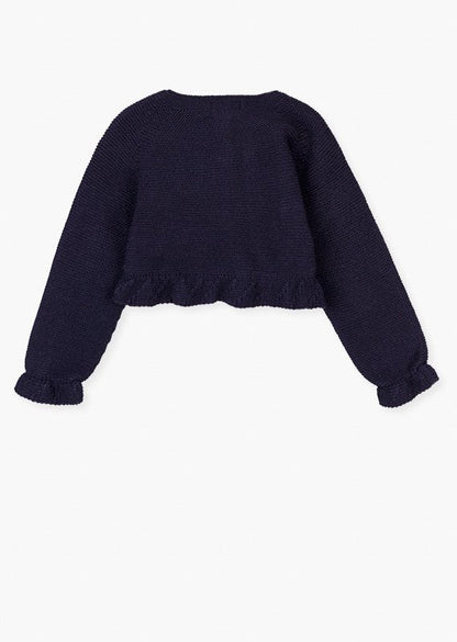 chaqueta con volantes en los puños