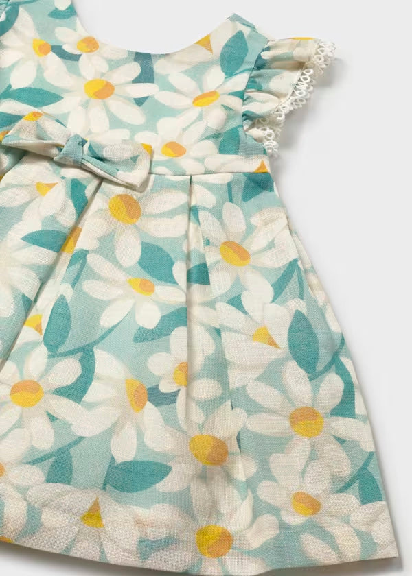 Vestido de ceremonia con volantes y estampado de flores verde lago