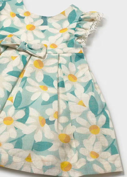 Vestido de ceremonia con volantes y estampado de flores verde lago