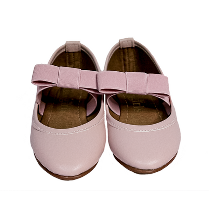 zapato color rosa con moño listón