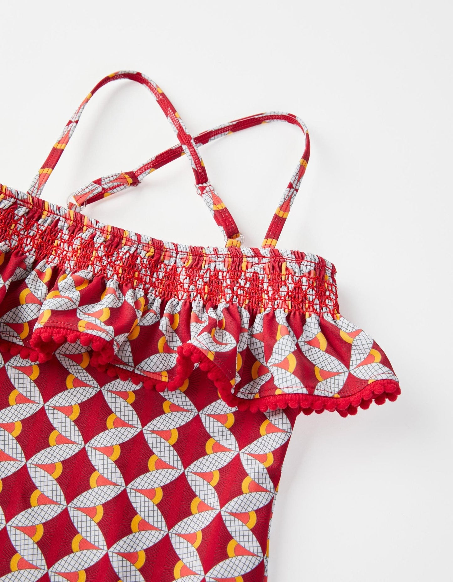 bañador rojo estampado olan con pompones