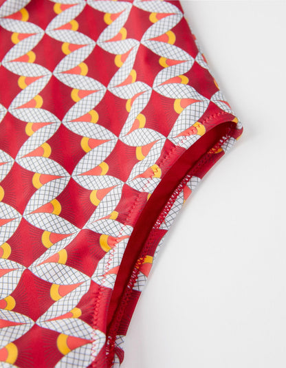 bañador rojo estampado olan con pompones