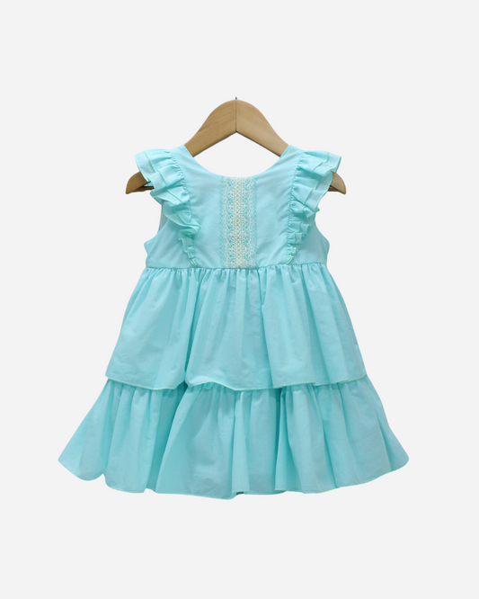 Vestido menta encaje en el pecho y dos olanes