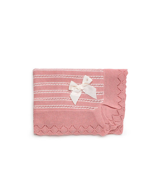Toquilla tejida color rosa palo, moño de falla