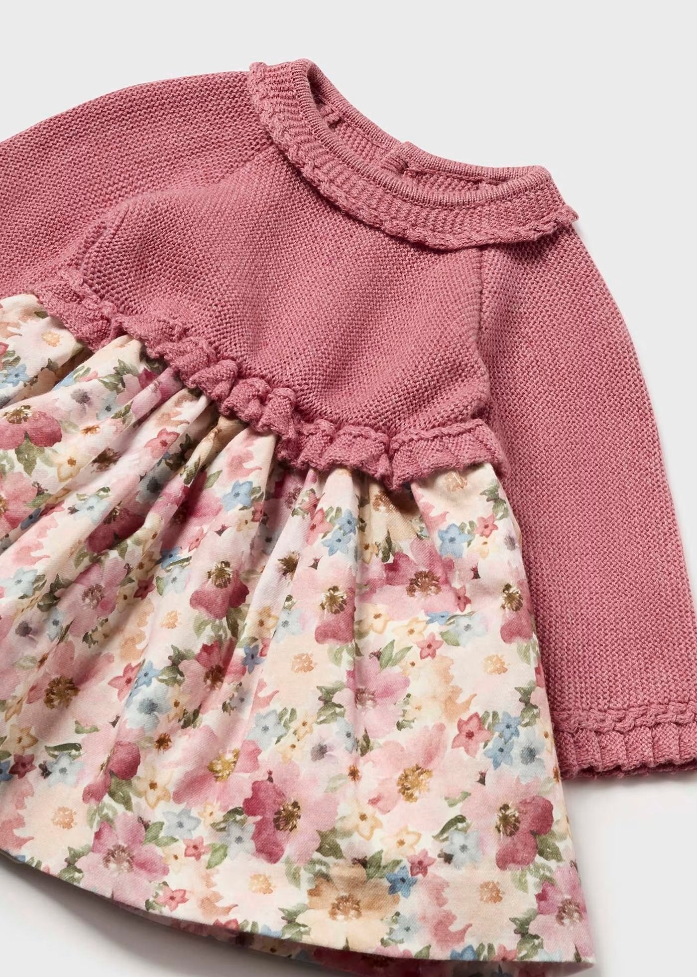 vestido tricot, peto rosa, con falda flores de colores