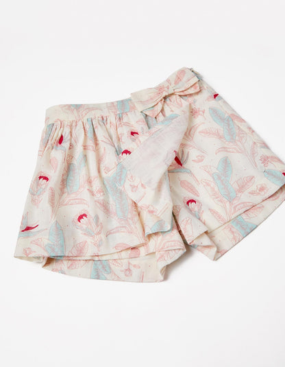 set camiseta ligth blue y short falda flores