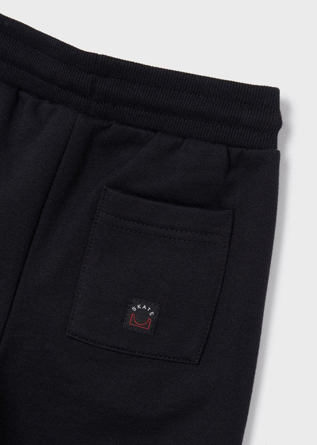 pants de dos piezas para niño con sudadera y pantalón largo.