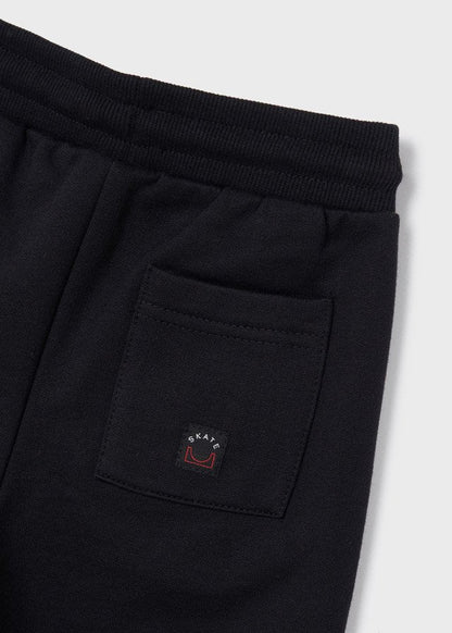 pants de dos piezas para niño con sudadera y pantalón largo.