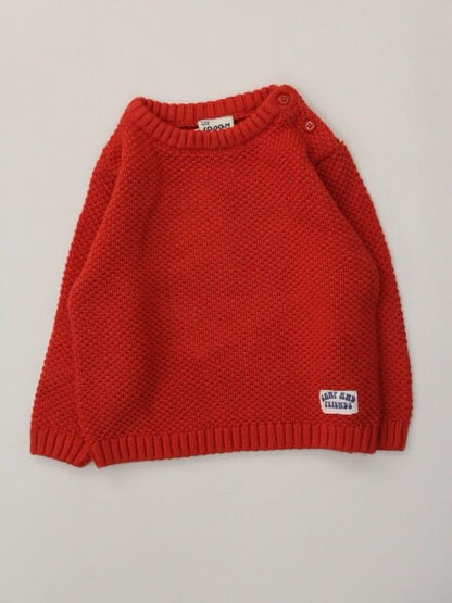 suéter tejido color narajna, cuello redondo